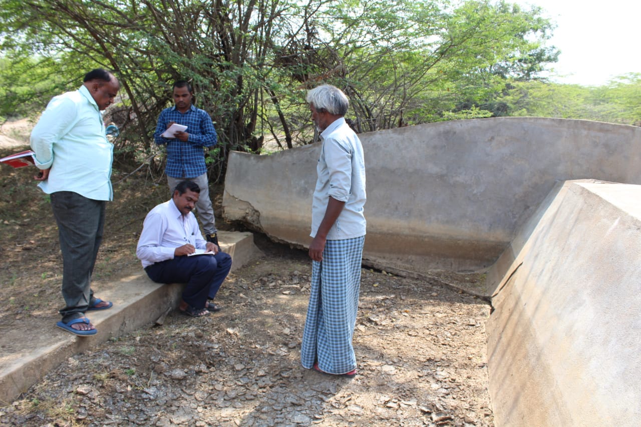 SIF volunteer studying the need for check dam renovation in Nellore