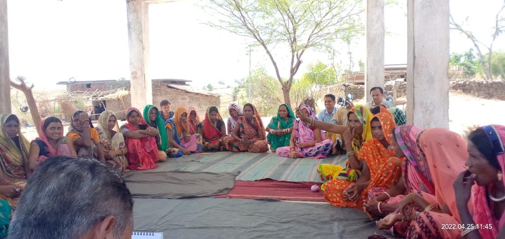 Meeting of women groups and discussing seed management with otehr women of the community